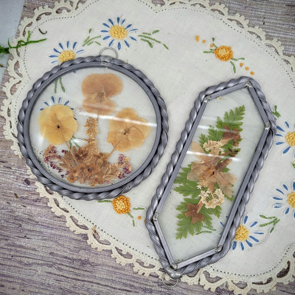 Vintage pressed flowers in glass